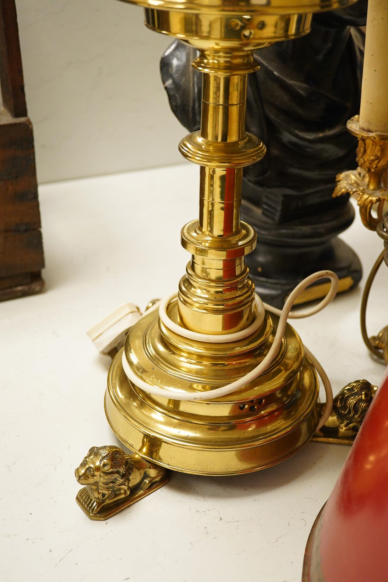 A plaster library bust possibly Keats?, an ormolu three light table lamp with red tole shade, 63cm high, and a large brass candlestick lamp on lion feet. Condition - fair to good